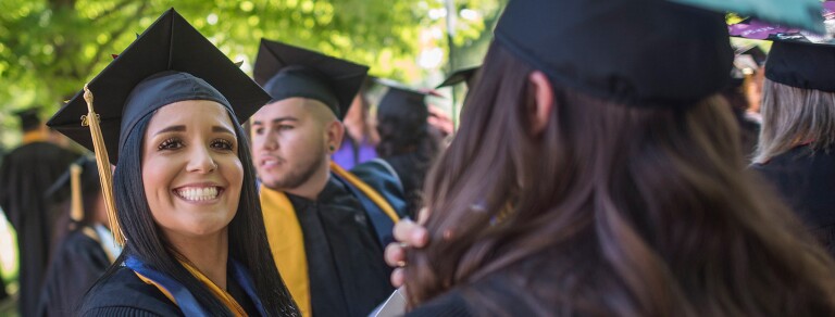 graduate front facing smiling