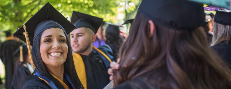 graduate front facing smiling