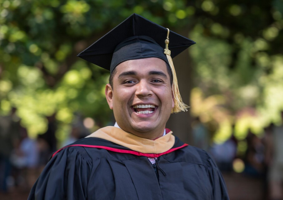graduate smiling front facing
